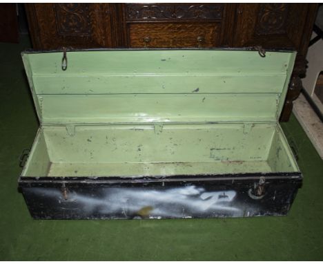 A vintage metal military trunk
