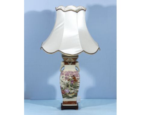 A Chinese style pottery table lamp and shade