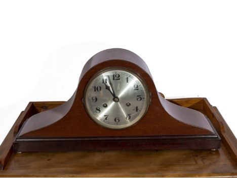 A mahogany mantle clock