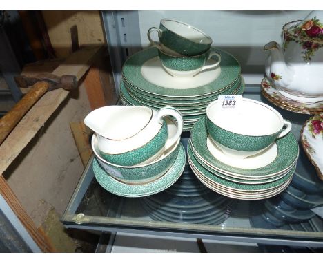 A quantity of Meakin "Florida" china to include: dinner plates, three cups and saucers, etc.