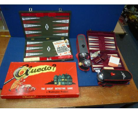 A quantity of vintage games to include two Backgammon sets with leather case, one large, one small plus two Petanque sets, ea