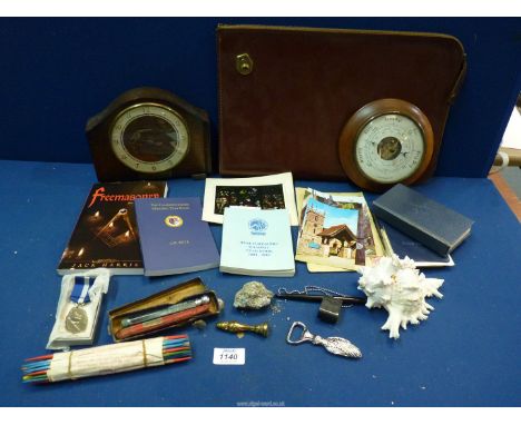 A quantity of miscellaneous to include: a document wallet, mantle clock, Masonic books, brass seal, tyre gauge, barometer, et