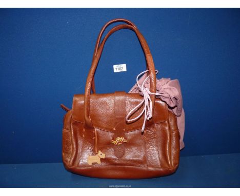 A dark brown leather Radley Handbag having front decorative trim, dog tag and dustbag.