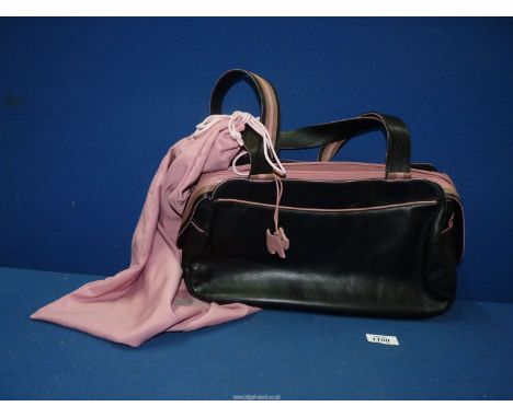 A black leather Radley Handbag having pink trim, dog tag and dustbag.