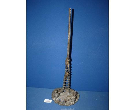 An unusual Chinoiserie type metal Centrepiece in the form of a Bamboo ladder narrowing at the top with with two figures on th