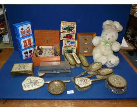 A quantity of miscellaneous to include: a Harrod's rabbit, a boxed chess set, part dressing table sets, boxed model vehicles,