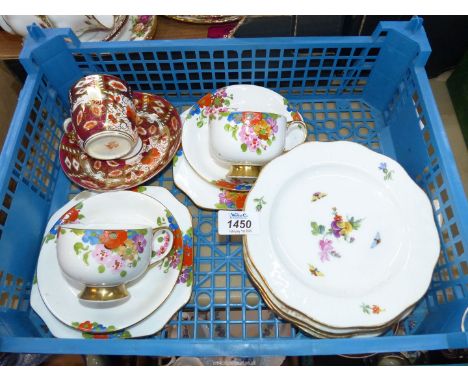 A red and gilt cabinet cup and saucer by J. Beech & Sons, four 'KPM' tea plates hand decorated with flowers and bugs, and two