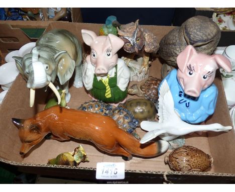 A quantity of animal ornaments to include: Royal Dux elephant, a Goebel owl, a Poole owl, Two National West piggy banks, a fa