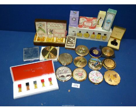 A small quantity of perfume and compacts to include: boxed Blue Grass perfume by Elizabeth Arden, boxed Melissa compact, Stra