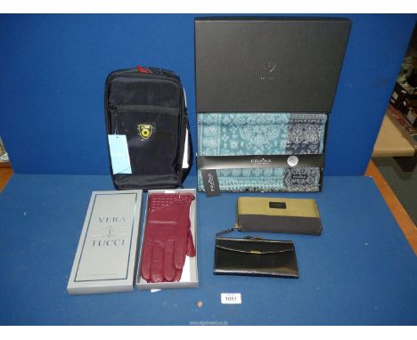 A small quantity of accessories to include: a leather black purse, a nylon Radley London purse. a pair of boxed Vera Tucci re