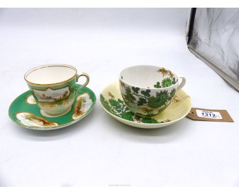 Two Spode cups and saucers including one with scenic panels on green ground, the other with green and brown foliage on white 