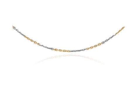 A GOLD WATCH CHAIN in 18ct yellow and white gold, stamped 18ct, 33.0cm, 9.3g.