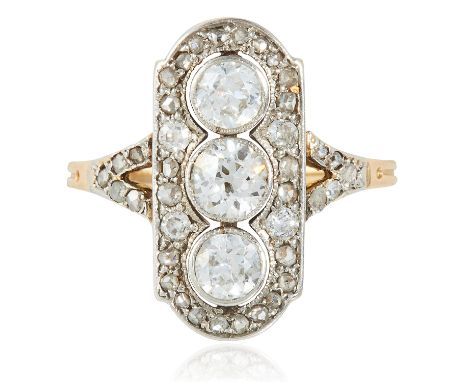 AN ART DECO DIAMOND RING in yellow gold and platinum, set with a trio of round cut diamonds totalling approximately 0.85 cara