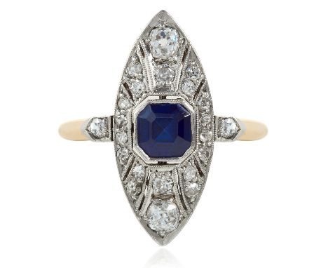 AN ART DECO SAPPHIRE AND DIAMOND RING in 18ct yellow gold and platinum, the marquise face set with a step cut sapphire accent