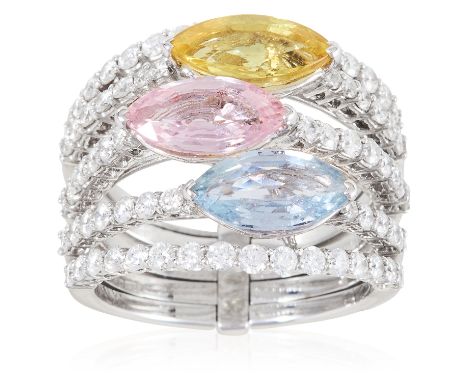 A SAPPHIRE, AQUAMARINE AND DIAMOND RING in 18ct white gold, formed of five adjoined, diamond jewelled bands set with a trio o