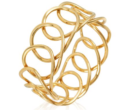A FANCY LINK GOLD BANGLE in 18ct yellow gold, designed as a woven loop overlapping itself, British import marks, inner diamet