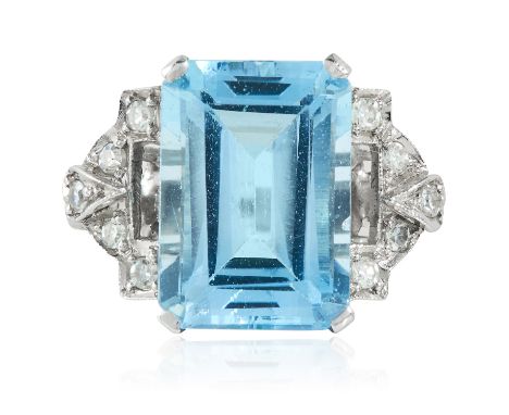 AN ANTIQUE ART DECO AQUAMARINE AND DIAMOND RING in platinum or white gold, the emerald cut aquamarine of 7.05 carats between 