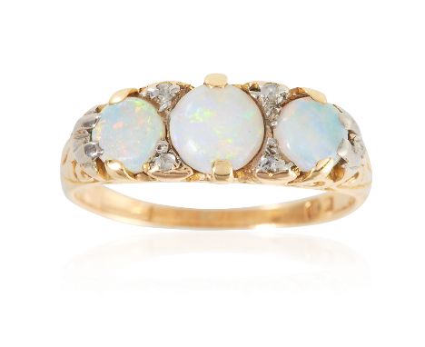 AN ANTIQUE OPAL AND DIAMOND RING in 18ct yellow gold, set with a trio of oval cabochon opals accented by diamonds, stamped 18