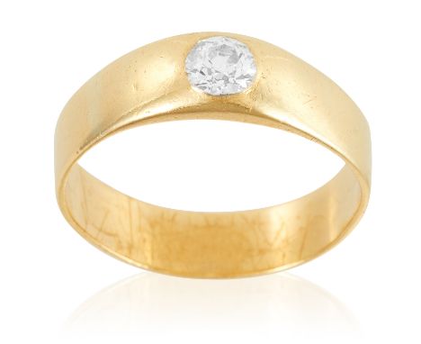 A DIAMOND DRESS RING in yellow gold, set with an old cut diamond of approximately 0.63 carats, unmarked, size V / 10.5, 5.93g