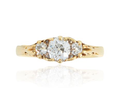 AN ANTIQUE DIAMOND RING in 18ct yellow gold, set with three old cut diamonds totalling approximately 0.50 carats, stamped 18C