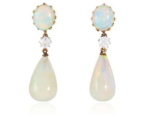 A PAIR OF OPAL AND DIAMOND DROP EARRINGS in high carat yellow gold each designed as a polished tapering opal drop suspended f