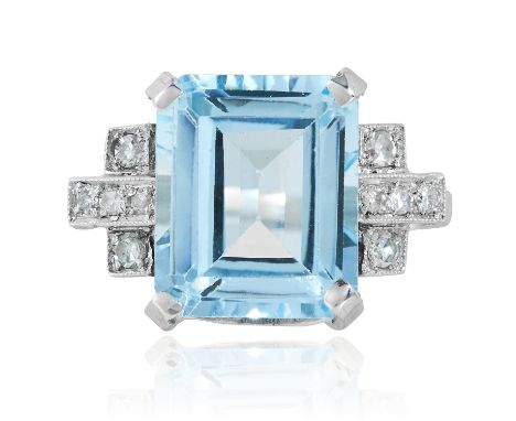 AN ART DECO AQUAMARINE AND DIAMOND RING in platinum or white gold, the emerald cut aquamarine of 5.10 carats between diamond 