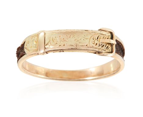AN ANTIQUE HAIRWORK BUCKLE MOURNING RING in high carat yellow gold, designed as a buckle within a band of woven hairwork, unm