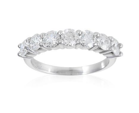 A 1.40 CARAT DIAMOND ETERNITY RING in 18ct white gold, set with seven round cut diamonds totalling approximately 1.40 carats,