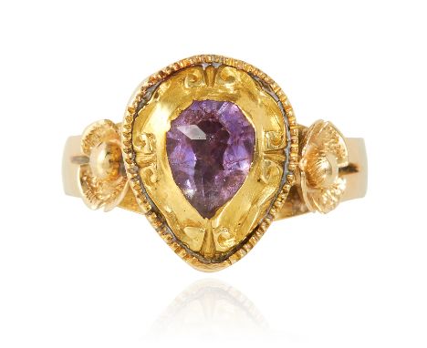 AN ANTIQUE AMETHYST DRESS RING, SPANISH in high carat yellow gold, set with a pear shaped rose cut amethyst within a late 18t