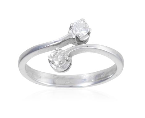 A DIAMOND TOI ET MOI RING, in 18ct white gold, designed as a crossover with 0.2ct of round cut diamonds, stamped 750, size K 
