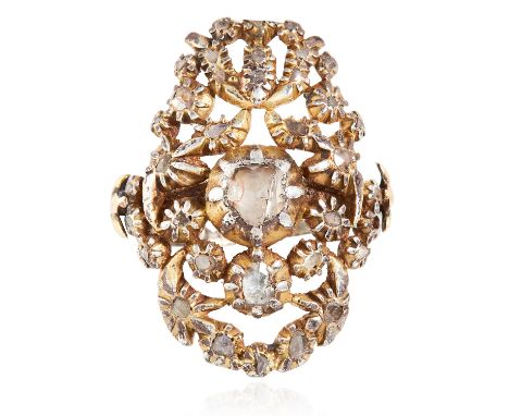 AN ANTIQUE DIAMOND RING, 19TH CENTURY in yellow gold and silver, the openwork scrolling design jewelled with rose cut diamond
