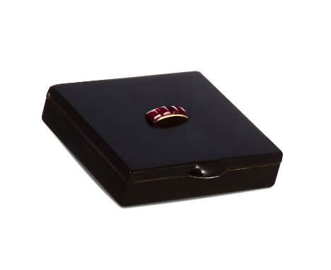 A RUBY AND ENAMEL BOX, CARTIER, CIRCA 1920, in silver gilt, in black enamel jewelled with cabochon rubies, signed Cartier Par
