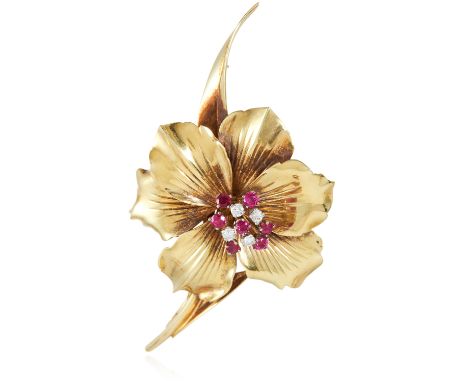 A RUBY AND DIAMOND FLOWER BROOCH, GARRARD &amp; CO in 14ct yellow gold, designed as a floral spray on an undulating stem, jew