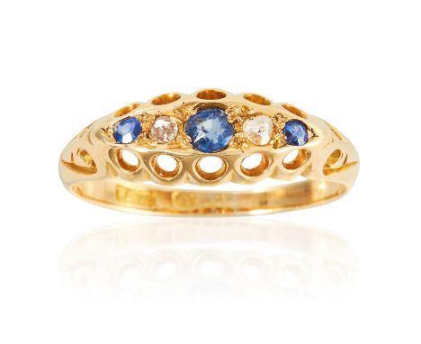 AN ANTIQUE SAPPHIRE AND DIAMOND FIVE STONE RING in yellow gold, set with three old cut sapphires and two old cut diamonds, ma