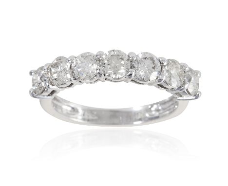 A 1.75 CARAT DIAMOND ETERNITY RING in 18ct white gold, set with seven round cut diamonds totalling 1.75 carats, stamped 750, 