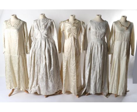 Circa 1920s and Later Wedding Dresses, comprising a cream floral printed silk drop waist dress, with long sleeves and V neckl