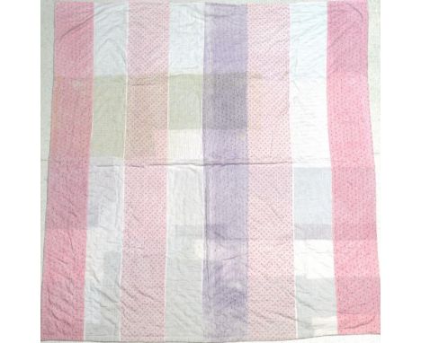 Late 19th Century Strippy Quilt, with panels of pink and mauve cotton, pieced pink cottons to the reverse, wave quilted, 190c