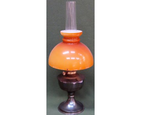 20th century Aladdin brass oil lamp with amber coloured glass shade. Approx. 62cm H

Used condition, not tested for working 