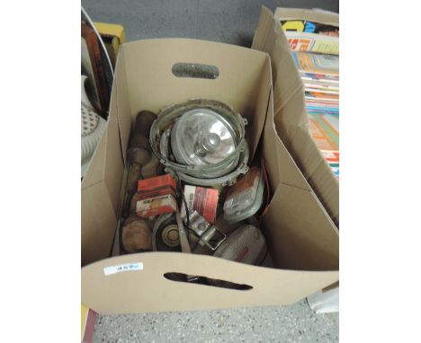 A selection of garagae tools and car parts