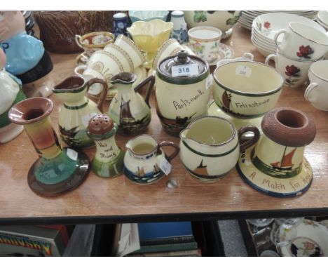 A selection of ceramic Torquay wares including candle stick