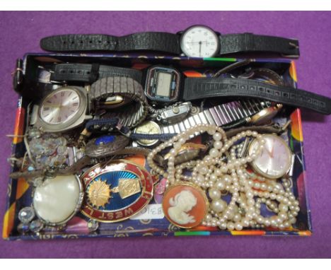 A selection of costume jewellery and wrist watches including Casio, Roamer and Sekonda