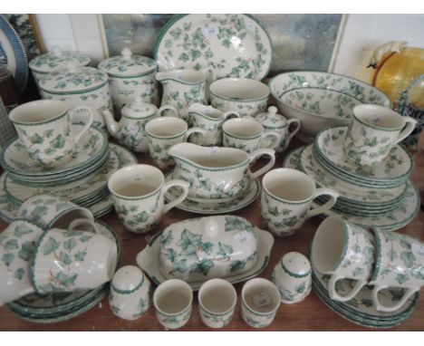 A part tea and dinner service in an Arthur Wood style