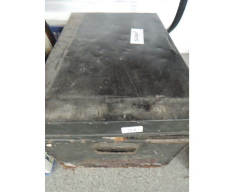 A vintage metal tin trunk