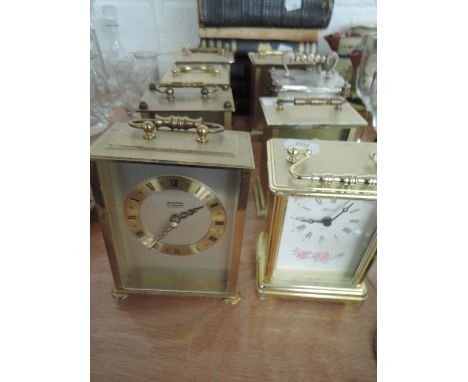 A selection of carriage style clock with brass designs various makes and models