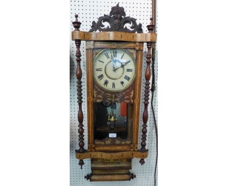 A Victorian American style rosewood and Tunbridge style wall clock