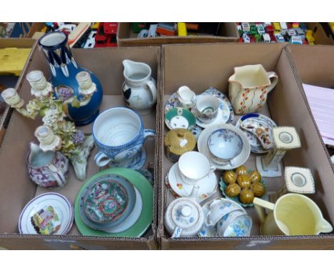 Two boxes of miscellaneous china including a pair of Royal Doulton candlesticks, Doulton ware, Harry Juniper three handled va