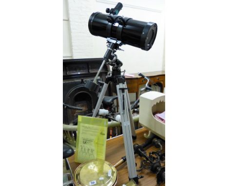 A Visionary Telesto 114 tripod mounted astronomical telescope