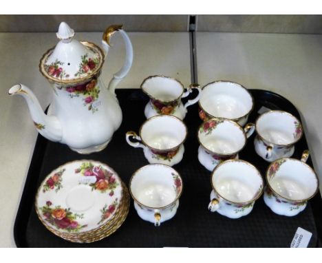 A Royal Albert Old Country Roses tea service comprising six cups and saucers, sugarbowl, milk jug and tea pot