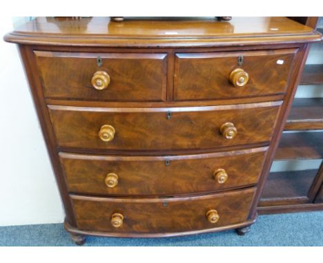 A Victorian mahogany bow-front chest of two short and three long graduated drawers on turned feet, 112cm wide