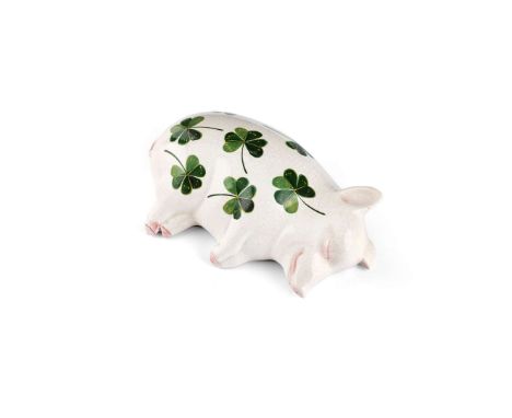   'SHAMROCKS' SLEEPING PIG glazed earthenware, painted and impressed maker’s mark WEMYSS   17cm long 